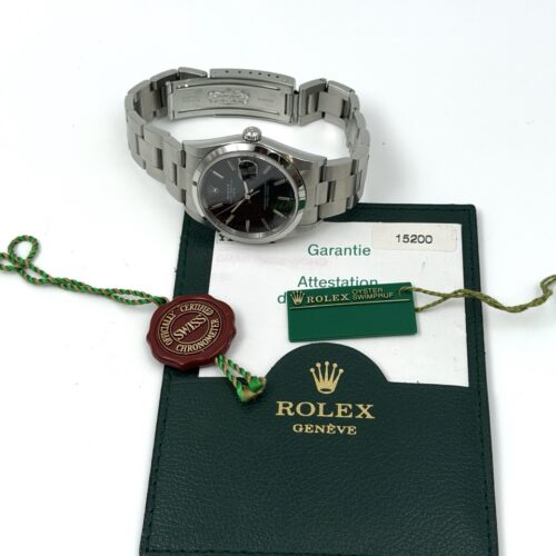 Rolex Date 15200 NOS Papers Booklet and green tag 2003
