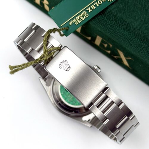 Rolex Date 15200 NOS Papers Booklet and green tag 2003